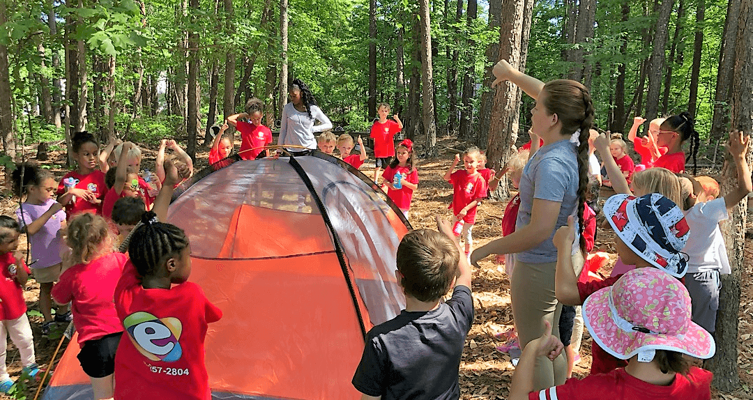 Our vacartion camp kids are setting up a tent on the nature trail at Mt. Elizabeth Academy in Kennesaw, Georgia.