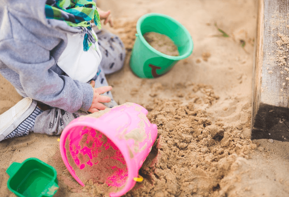 Child Playing with Sand